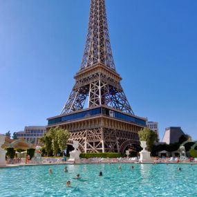 You won’t get a view like this at any other Las Vegas pool. Pool à Paris is located right underneath the hotel’s Eiffel Tower replica, positioned in the heart of the Strip.