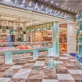 The Bacchanal Buffet in Las Vegas Caesars Palace is a feast for the eyes as much as for your stomach. The Bacchanal Buffet is the largest buffest in Las Vegas with over 10 kitchens, 9 chef-attended stations, 250+ menu items, and infinite flavors.