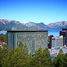 Harrah's Lake Tahoe exterior. At Harrah's Lake Tahoe you can relax in luxe hotel rooms with premier amenities, play the slots and tables at the casino, reserve a table at a world-class restaurant, and get in on the vibrant nightlife.