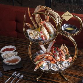 Seafood Tower at Jack Binion’s Steak, inside Horseshoe Las Vegas. Jack Binion delivers on the legacy of the Binion name with an acclaimed selection of steaks cooked to perfection in an 1800-degree double broiler. Indulge in our seafood tower, innovative side dishes or satisfy your sweet tooth with a delectable dessert. Sip signature cocktails or choose your favorite drink from our award-winning wine and beer selection, right in the heart of the famed Vegas Strip.