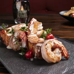 Shrimp at Jack Binion’s Steak, inside Horseshoe Las Vegas. Jack Binion delivers on the legacy of the Binion name with an acclaimed selection of steaks cooked to perfection in an 1800-degree double broiler. Indulge in our seafood tower, innovative side dishes or satisfy your sweet tooth with a delectable dessert. Sip signature cocktails or choose your favorite drink from our award-winning wine and beer selection, right in the heart of the famed Vegas Strip.