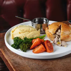 Hand-raised Charter pie, chicken, ham & leek, buttered mash, spring greens