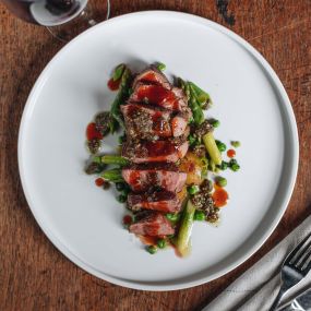 South West lamb rump, asparagus & peas, sautéed potatoes, green salsa