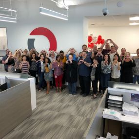 Omni Logistics Dallas Headquarters team members celebrating launch of new brand