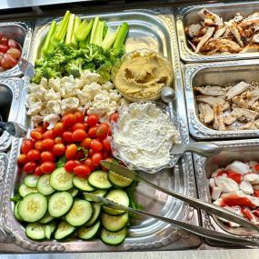 Fresh salad bar toppings meats, fruits and vegetables