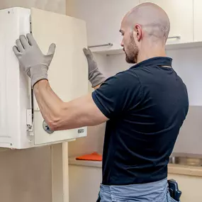 Chauffagiste Garanka lors d'un dépannage de chaudière gaz.