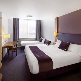 Premier Inn family room with double bed and two single beds