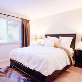 Bedroom at Hamilton Trace apartments in Road Okemos, MI