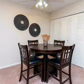 Dining area at Hamilton Trace apartments in Road Okemos, MI