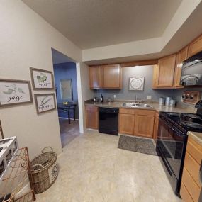 Kitchen at Castle Pointe Apartments in Lansing, MI