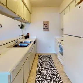 Kitchen at Castle Pointe Apartments in Lansing, MI