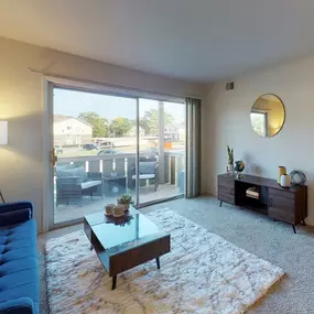 Living room at Castle Pointe Apartments in Lansing, MI