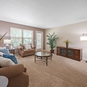 Living room at Burwick Farms Apartment Homes at Howell, MI