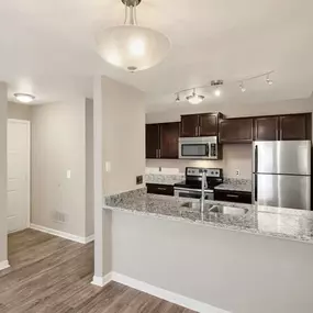 Kitchen at Burwick Farms Apartment Homes at Howell, MI