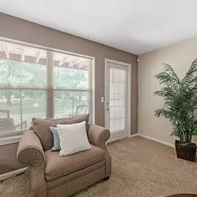 Living room at Burwick Farms Apartment Homes at Howell, MI