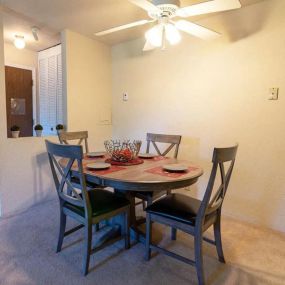 Dining area at Nemoke Trails apartments in Haslett, MI