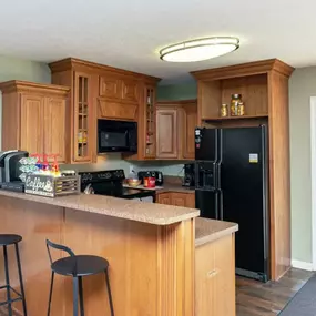 Kitchen at Nemoke Trails apartments in Haslett, MI