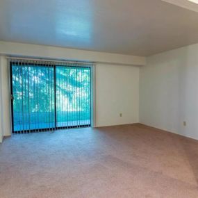 Living room at Lakewood Apartments in Haslett, MI