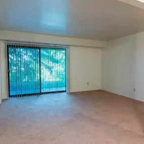 Living room at Lakewood Apartments in Haslett, MI