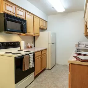 Kitchen at Lakewood Apartments in Haslett, MI