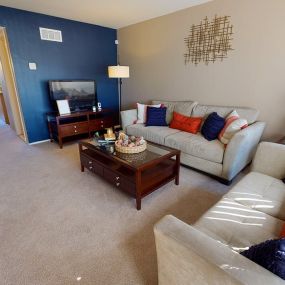 Living room in Fairlane East apartments