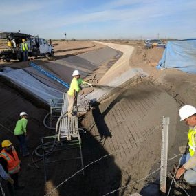 Trapezoidal drainage channel shotcrete installation by BAM Shotcrete