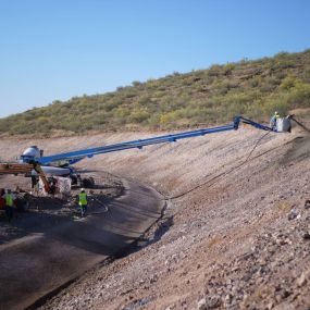 Commercial shotcrete v-ditch installation by BAM Shotcrete