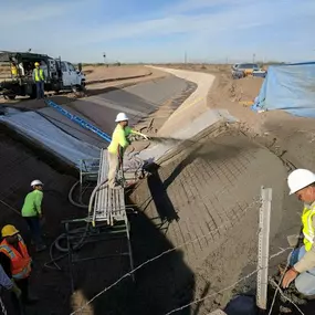 Trapezoidal drainage channel shotcrete installation by BAM Shotcrete