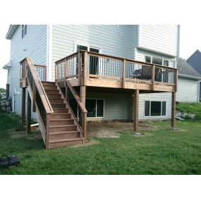 Create a versatile outdoor space with a deck and stairs from Wild Construction.