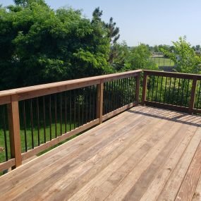 Expand your living space and enjoy the outdoors with a beautiful wooden deck from Wild Construction.