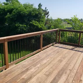 Expand your living space and enjoy the outdoors with a beautiful wooden deck from Wild Construction.