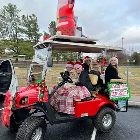 Customers enjoying our Santa cart!