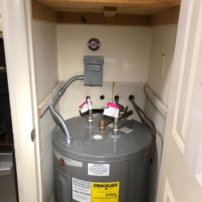 Installation of a new hot water heater required bringing the electrical work up to 2023 NEC (National Electrical Code). Mandatory disconnect and protect the 10 gauge copper wired with armored cable.