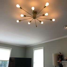 Removed existing and installed a new Franklyn Chandelier with LED dimmable bulbs.