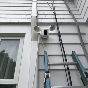 Installed a Ring Floodlight with a built-in camera and motion sensor.