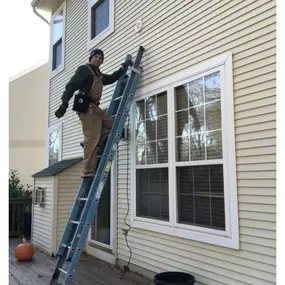 Installing some exterior electrical lighting on a cold morning.