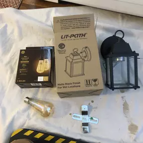 Swapping out the old and installing a beautiful single bulb front entry light by LIT-PATH. Plus, adding a touch of vintage charm with a LED 60 watt bulb wrapped in a charming amber glass. Casting a beautiful glow. Client was thrilled!