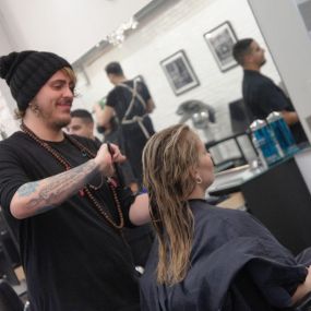 Trent working on a customers hair