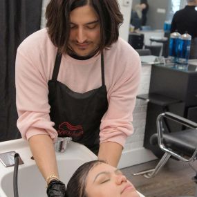 Ash working on a customers hair