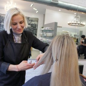 Kate working on a customers hair