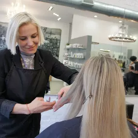 Kate working on a customers hair