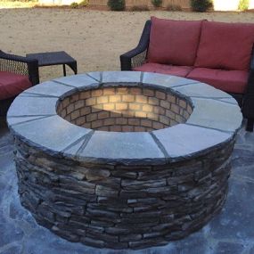 Custom fire pit by Archadeck of Central SC.