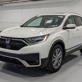 2022 Honda CRV Toruing AWD in Platinum White.