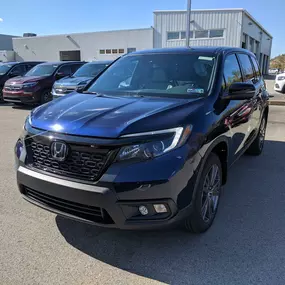 2021 Honda Passport EX-L AWD  in Obsidian Blue.