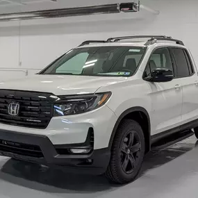 2022 Honda Ridgeline Black Edition AWD in Platinum White.