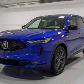 2022 Acura MDX with A-Spec Package in Apex Blue.