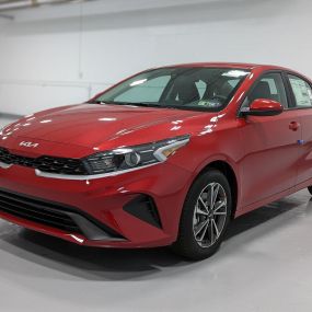 2022 Kia Forte LXS- IVT in Currant Red.