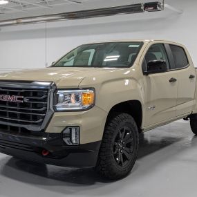 2022 GMC Canyon 4WD AT4 with Leather in Desert Sand.
