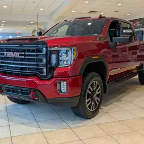 2022 GMC Sierra 2500HD AT4 in Cayenne Red.