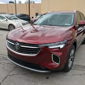 2021 Buick Envision Essence in Cinnabar Metallic.